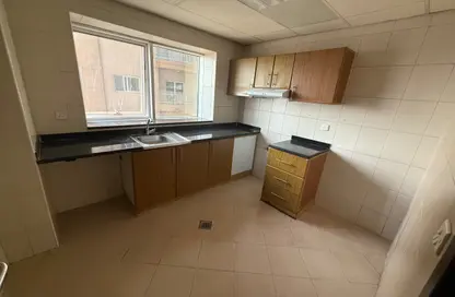 Apartment - 1 Bedroom - 1 Bathroom for rent in Tiger Building Al Qadesia - Al Nahda - Sharjah