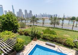 Pool image for: Villa - 4 bedrooms - 4 bathrooms for sale in Garden Hall - Mediterranean Clusters - Jumeirah Islands - Dubai, Image 1