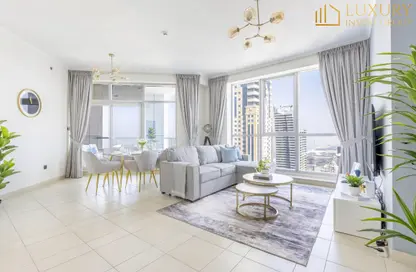 Living / Dining Room image for: Apartment - 3 Bedrooms - 3 Bathrooms for sale in The Torch - Dubai Marina - Dubai, Image 1