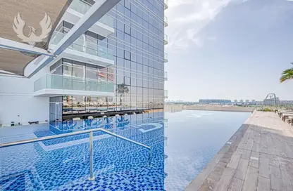 Pool image for: Apartment - 1 Bathroom for sale in Carson - DAMAC Hills - Dubai, Image 1