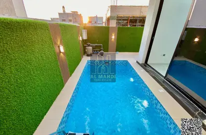 Villa - 5 Bedrooms - 7 Bathrooms for sale in Al Zaheya Gardens - Al Zahya - Ajman