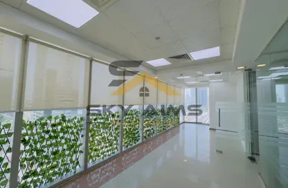 Full Floor - Studio - 2 Bathrooms for rent in The Prism - Business Bay - Dubai