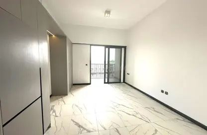 Empty Room image for: Apartment - 1 Bathroom for sale in MAG Eye - District 7 - Mohammed Bin Rashid City - Dubai, Image 1