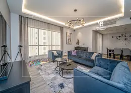 Living Room image for: Apartment - 3 Bedrooms - 4 Bathrooms for sale in Shams 1 - Shams - Jumeirah Beach Residence - Dubai, Image 1