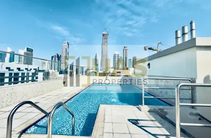 Apartment - 1 Bedroom - 2 Bathrooms for rent in Jumeirah Garden City - Al Satwa - Dubai