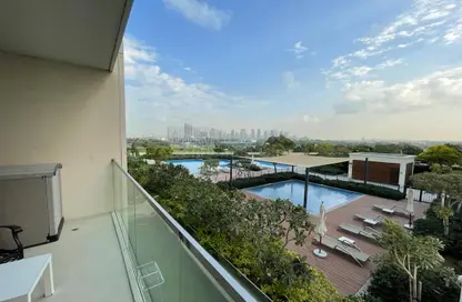 Balcony image for: Apartment - 2 Bedrooms - 2 Bathrooms for sale in Vida Residence 2 - Vida Residence - The Hills - Dubai, Image 1
