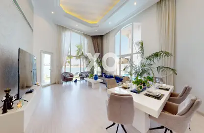 Living / Dining Room image for: Villa - 5 Bedrooms - 6 Bathrooms for rent in Garden Homes Frond D - Garden Homes - Palm Jumeirah - Dubai, Image 1