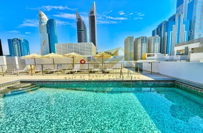 Apartment - 1 Bedroom - 2 Bathrooms for rent in Jumeirah Garden City - Al Satwa - Dubai