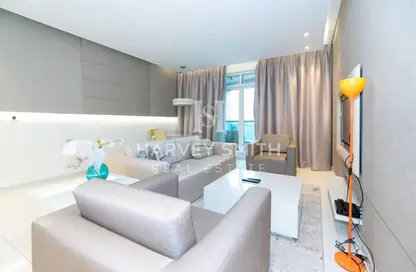 صورة لـ غرفة المعيشة شقة - 2 غرف نوم - 3 حمامات للبيع في داماك ميزون ذو فوغ - الخليج التجاري - دبي ، صورة رقم 1