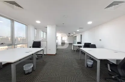Office Space - Studio - 3 Bathrooms for rent in Hussain Al Muallah Tower - Al Nahyan - Abu Dhabi