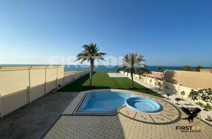 Pool image for: Villa - 5 Bedrooms - 7 Bathrooms for sale in Royal Marina Villas - Marina Village - Abu Dhabi, Image 1