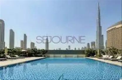 Pool image for: Apartment - 2 Bedrooms - 2 Bathrooms for rent in Downtown Views II Tower 1 - Downtown Views II - Downtown Dubai - Dubai, Image 1