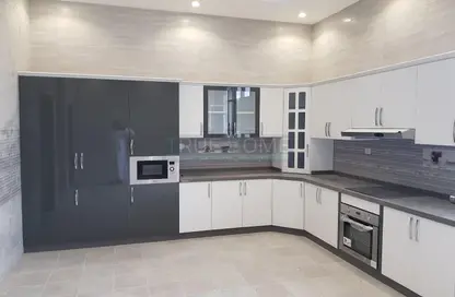 Kitchen image for: Villa - 5 Bedrooms for sale in Hoshi 1 - Hoshi - Al Badie - Sharjah, Image 1