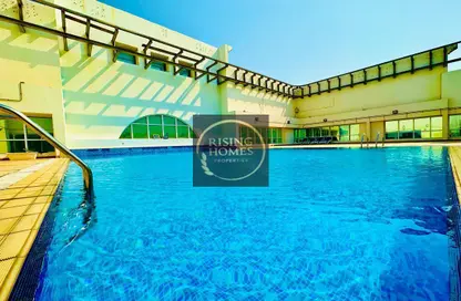 Pool image for: Apartment - 1 Bedroom - 2 Bathrooms for rent in Al Hana Tower - Al Khalidiya - Abu Dhabi, Image 1