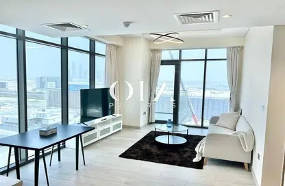 Living / Dining Room image for: Apartment - 1 Bedroom - 1 Bathroom for sale in Farhad Azizi Residence - Al Jaddaf - Dubai, Image 1