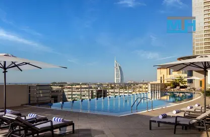 Pool image for: Hotel  and  Hotel Apartment - 2 Bedrooms - 3 Bathrooms for rent in Staybridge Suites - Dubai Media City - Dubai, Image 1