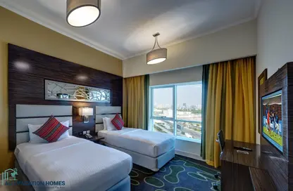 النزل و الشقق الفندقية - 2 غرف نوم - 2 حمامات للايجار في فندق فينتدج جراند - مدينة دبي للإنتاج (اي ام بي زد) - دبي