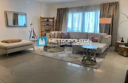 Living Room image for: Apartment - 2 Bedrooms - 2 Bathrooms for rent in Tower 22 - Al Reef Downtown - Al Reef - Abu Dhabi, Image 1
