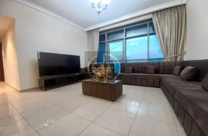 Living Room image for: Apartment - 2 Bedrooms - 2 Bathrooms for rent in Ajman Corniche Residences - Ajman Corniche Road - Ajman, Image 1
