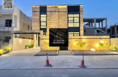 Villa - 5 Bedrooms - 7 Bathrooms for sale in Ajman Hills - Al Alia - Ajman