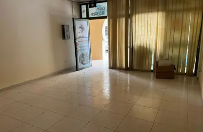 متجر - استوديو - 1 حمام للايجار في Y23 - طراز إنجليزي - المدينة الدولية - دبي