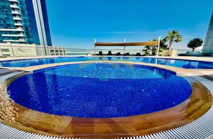 Pool image for: Apartment - 1 Bedroom - 2 Bathrooms for rent in Sea Face Tower - Shams Abu Dhabi - Al Reem Island - Abu Dhabi, Image 1