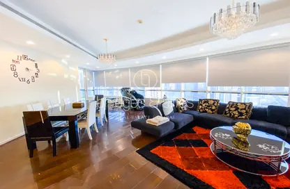 Living / Dining Room image for: Apartment - 4 Bedrooms - 4 Bathrooms for rent in Horizon Tower - Dubai Marina - Dubai, Image 1