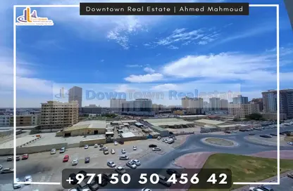 Outdoor Building image for: Apartment - 2 Bedrooms - 3 Bathrooms for sale in Tower B3 - Ajman Pearl Towers - Ajman Downtown - Ajman, Image 1