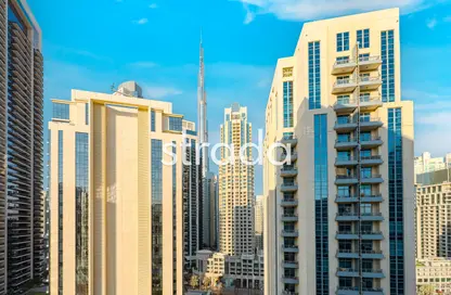 Outdoor Building image for: Apartment - 2 Bedrooms - 3 Bathrooms for rent in Bahwan Tower Downtown - Downtown Dubai - Dubai, Image 1