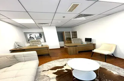 Living Room image for: Office Space - Studio - 3 Bathrooms for rent in Iris Bay - Business Bay - Dubai, Image 1