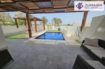 Pool image for: Townhouse - 3 Bedrooms - 3 Bathrooms for rent in The Townhouses at Al Hamra Village - Al Hamra Village - Ras Al Khaimah, Image 1
