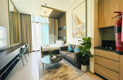 Living Room image for: Apartment - 1 Bathroom for rent in Signature Livings - Jumeirah Village Circle - Dubai, Image 1 Living Room image for: Apartment - 1 Bathroom for rent in Signature Livings - Jumeirah Village Circle - Dubai, Image 1