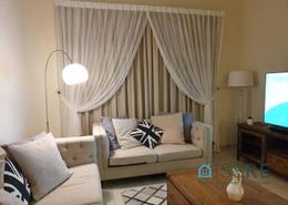صورةغرفة المعيشة لـ: شقة - 1 غرفة نوم - 2 حمامات للبيع في فلورنس 1 - توسكان رزدنس - قرية الجميرا سركل - دبي, صورة 1