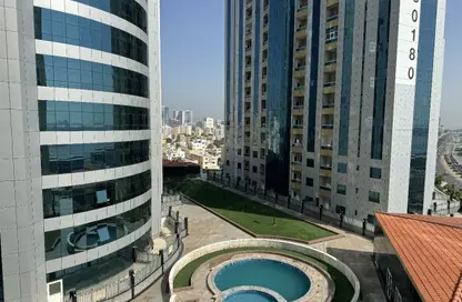شقة - غرفة نوم - 2 حمامات للايجار في أورينت تاور 2 - أورينت تاور - البستان - عجمان