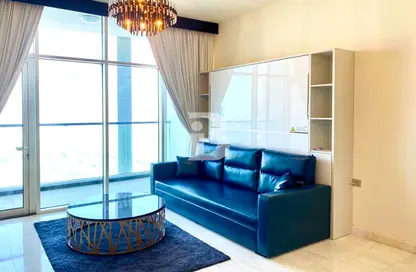 صورة لـ غرفة المعيشة شقة - غرفة نوم - 2 حمامات للبيع في برج تالا - مارينا سكوير - جزيرة الريم - أبوظبي ، صورة رقم 1