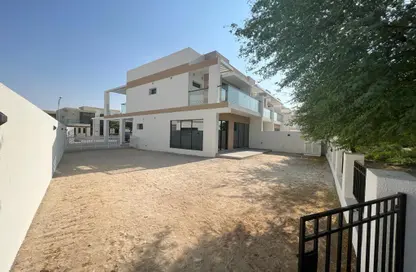 Outdoor House image for: Townhouse - 4 Bedrooms - 4 Bathrooms for sale in Rochester - DAMAC Hills - Dubai, Image 1