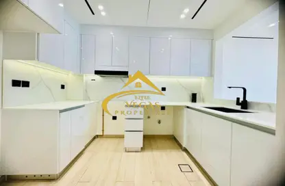 صورة لـ مطبخ شقة - غرفة نوم - 2 حمامات للايجار في بن غاطي نوفا - قرية الجميرا سركل - دبي ، صورة رقم 1