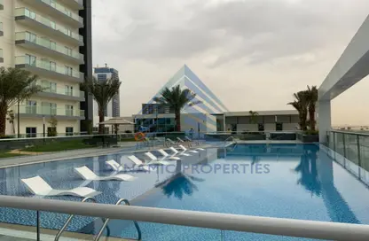 صورة لـ حوض سباحة شقة - 2 غرف نوم - 2 حمامات للبيع في بيلا روز - جنوب البرشاء - البرشاء - دبي ، صورة رقم 1