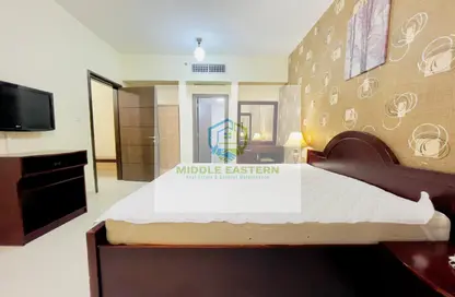 Room / Bedroom image for: Apartment - 1 Bedroom - 1 Bathroom for rent in Al Nahyan Camp - Abu Dhabi, Image 1