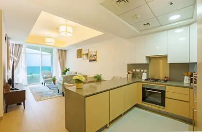 Kitchen image for: Apartment - 1 Bedroom - 2 Bathrooms for rent in MINA by Azizi - Palm Jumeirah - Dubai, Image 1