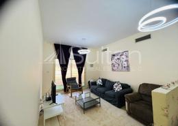 Living Room image for: Apartment - 1 bedroom - 2 bathrooms for rent in Golf Apartments - Al Hamra Village - Ras Al Khaimah, Image 1