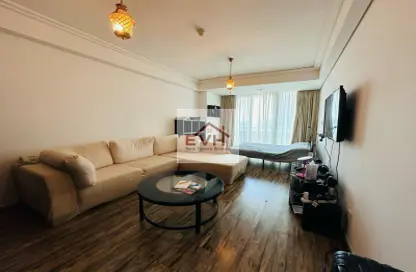 Living Room image for: Apartment - 1 Bathroom for sale in Goldcrest Views 2 - Lake Almas West - Jumeirah Lake Towers - Dubai, Image 1