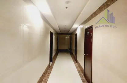 Hall / Corridor image for: Whole Building - Studio for sale in Al Nafoora 1 building - Al Rawda 2 - Al Rawda - Ajman, Image 1