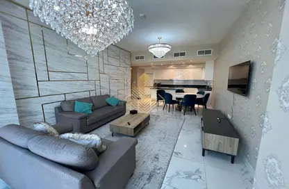 Living / Dining Room image for: Apartment - 3 Bedrooms - 4 Bathrooms for rent in Amna - Al Habtoor City - Business Bay - Dubai, Image 1