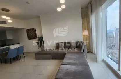 Living / Dining Room image for: Apartment - 2 Bedrooms - 3 Bathrooms for rent in Damac Heights - Dubai Marina - Dubai, Image 1