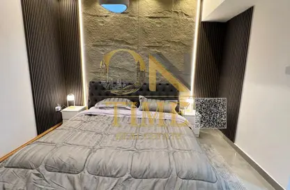 Apartment - 1 Bedroom - 2 Bathrooms for sale in Tower B1 - Ajman Pearl Towers - Ajman Downtown - Ajman