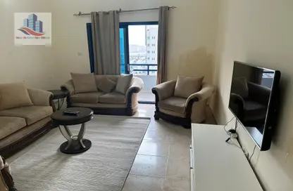 Living Room image for: Apartment - 1 Bedroom - 2 Bathrooms for rent in Al Khan Lagoon - Al Khan - Sharjah, Image 1