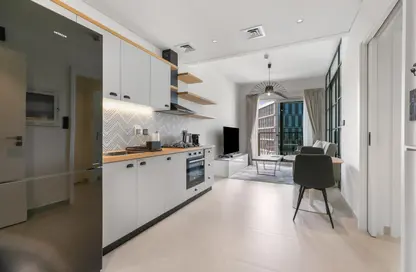 صورة لـ مطبخ شقة - غرفة نوم - 1 حمام للايجار في كوليكتيف - دبي هيلز استيت - دبي ، صورة رقم 1