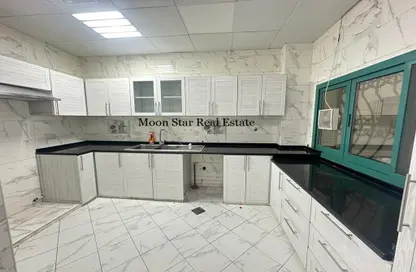 Kitchen image for: Apartment - 2 Bedrooms - 2 Bathrooms for rent in C2302 - Khalifa City A - Khalifa City - Abu Dhabi, Image 1