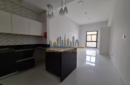 Kitchen image for: Apartment - 1 Bathroom for sale in Plazzo Residence - Jumeirah Village Triangle - Dubai, Image 1
